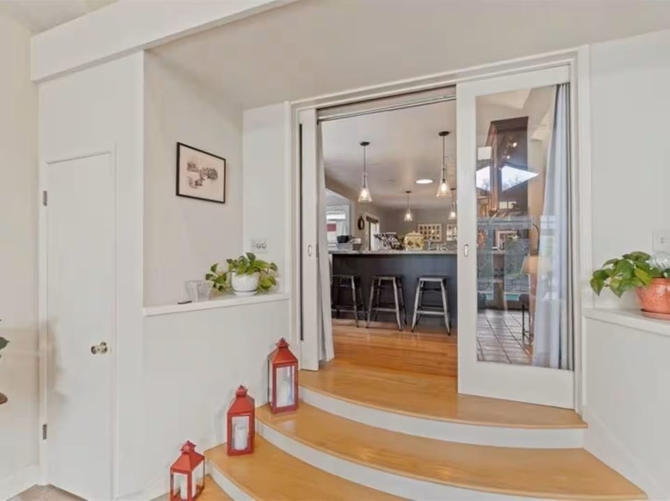 Step into the light-filled great living room from the kitchen