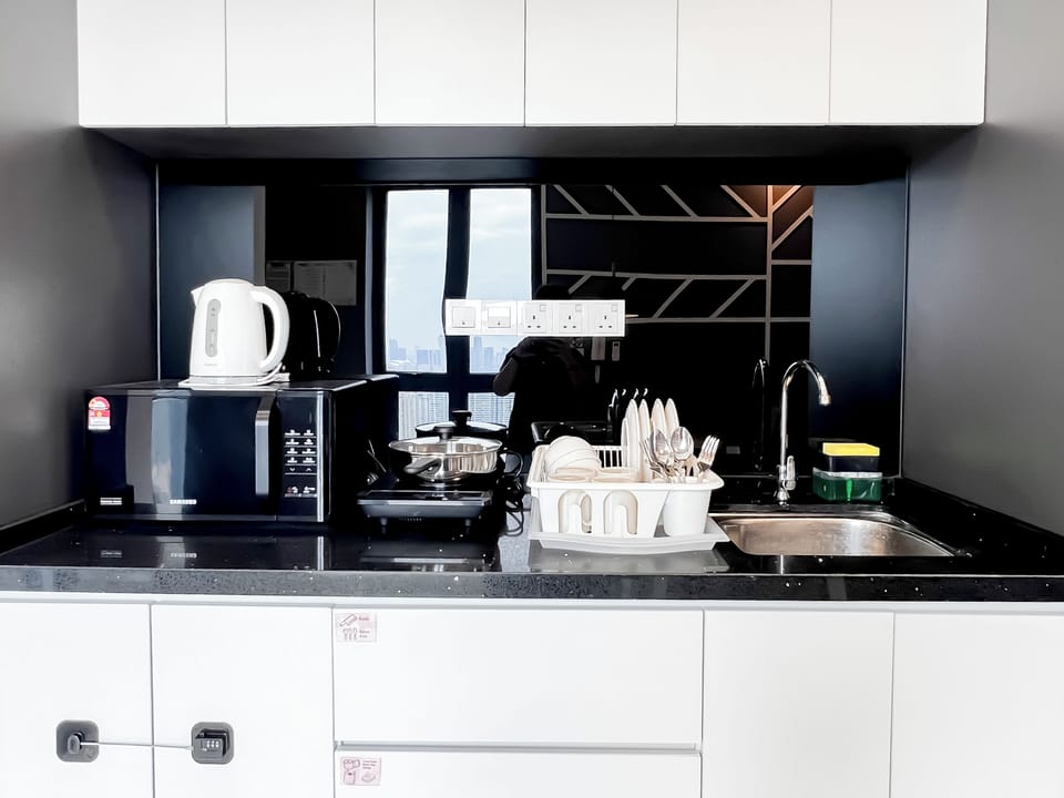 Apartment, 2 Bedrooms | Living area | 40-inch flat-screen TV with cable channels