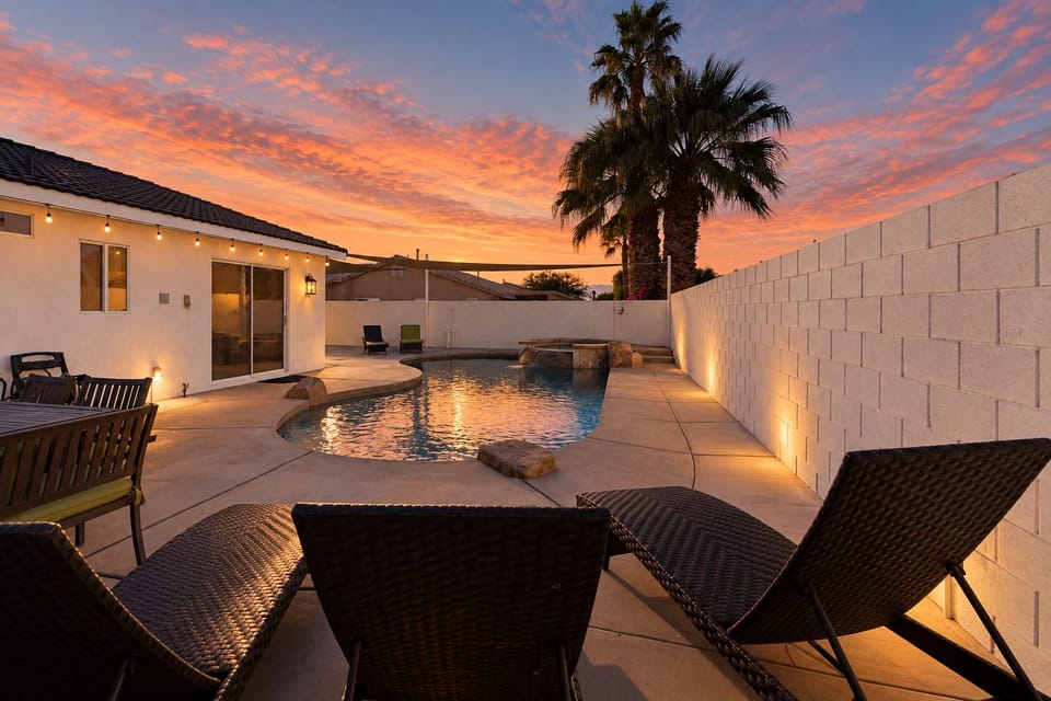 Grab a sun lounger by the pool.