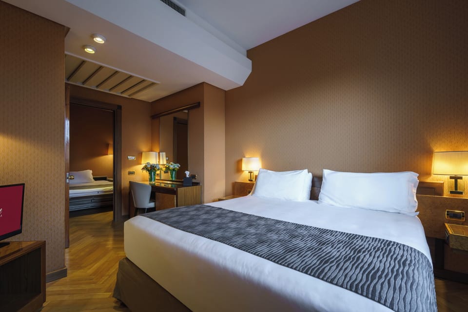 Family Room, 2 Bedrooms | Minibar, in-room safe, desk, free WiFi