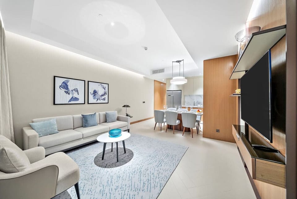 Open-concept living: lounge, dining, and kitchen flow in seamless style. (