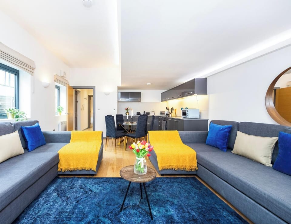 LIVING ROOM WITH DOUBLE SOFA BEDS