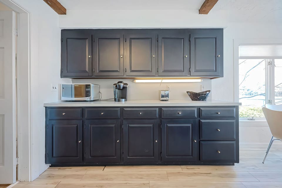 A fully equipped kitchen with ample counter space.