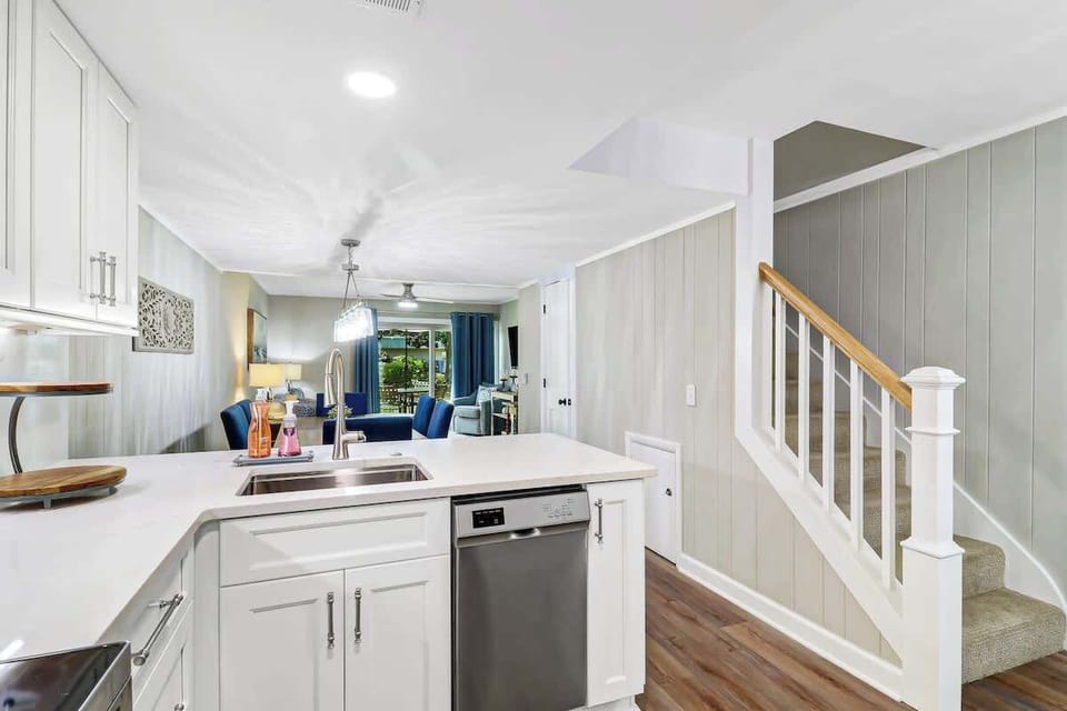 Your spacious open-plan kitchen flows seamlessly into the living area, perfect for preparing meals while staying connected with family and friends.