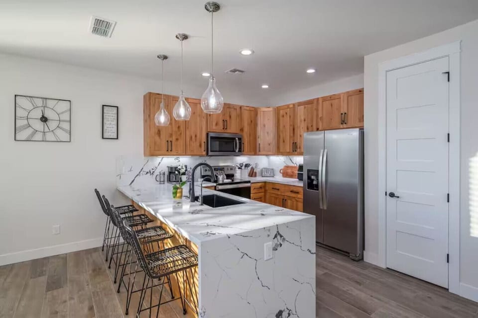 Well appointed kitchen is equipped with everything you need to prepare a gourmet meal - or order in, your choice!