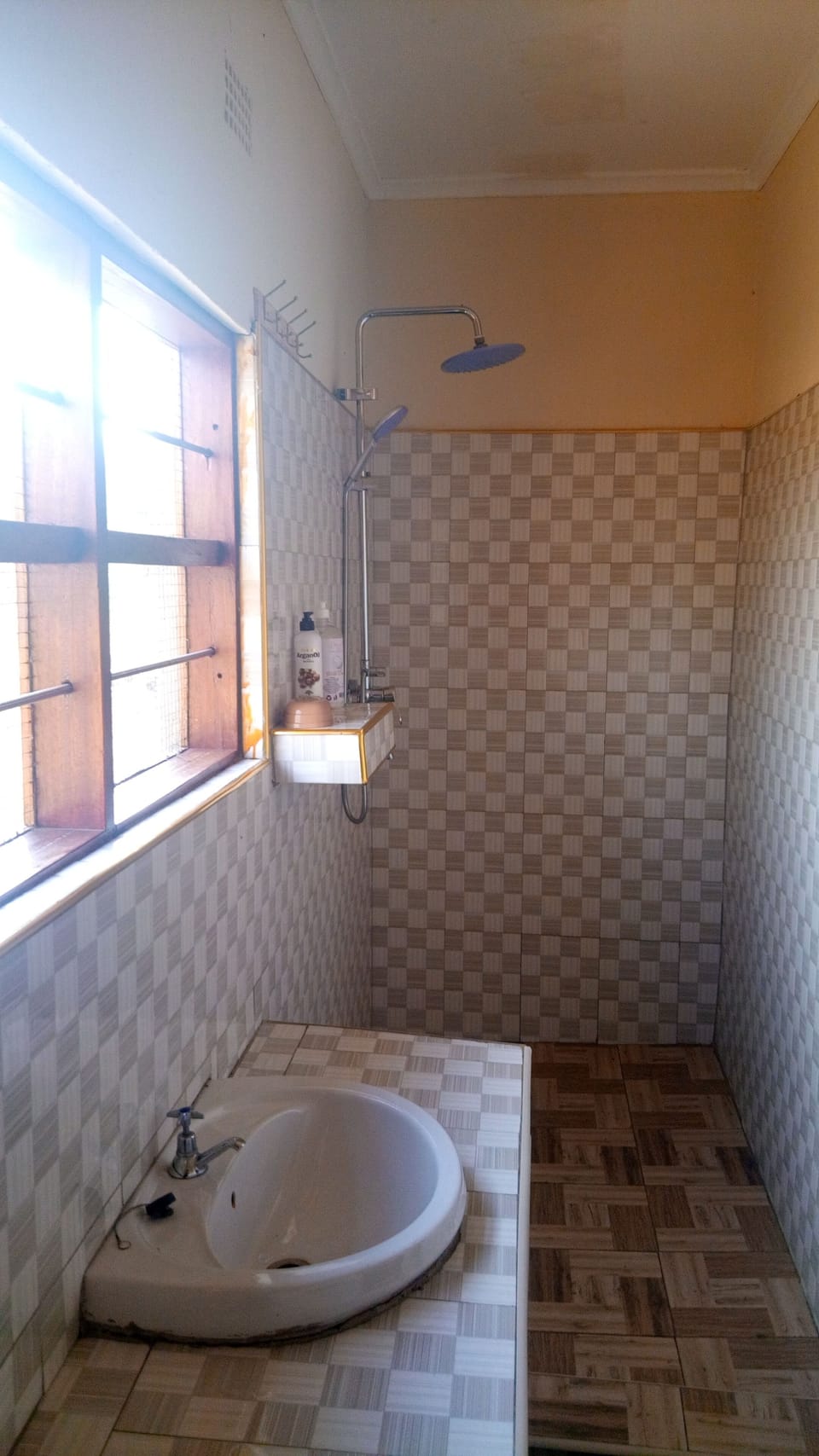 Shower, slippers, towels, soap
