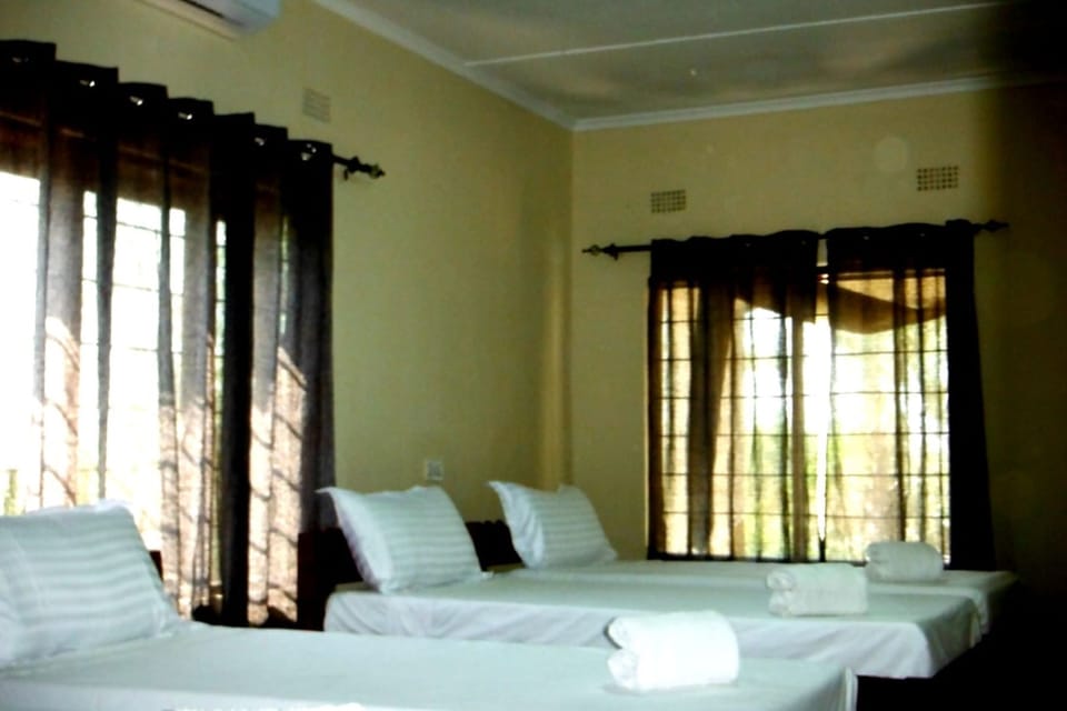Premium bedding, down comforters, desk, laptop workspace