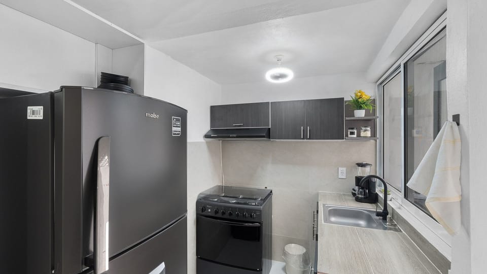 Family Chalet | Private kitchen | Full-size fridge, microwave, oven, cookware/dishes/utensils