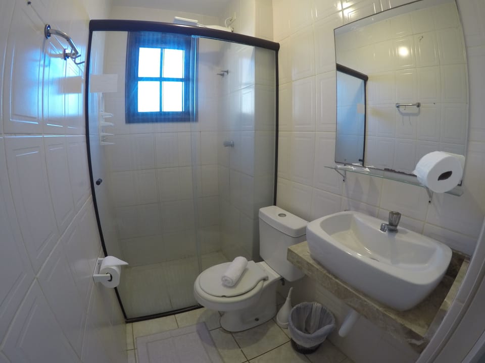 Shower, towels, soap, toilet paper