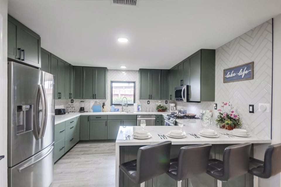 Share meals or set up a makeshift workspace in the spacious kitchen island