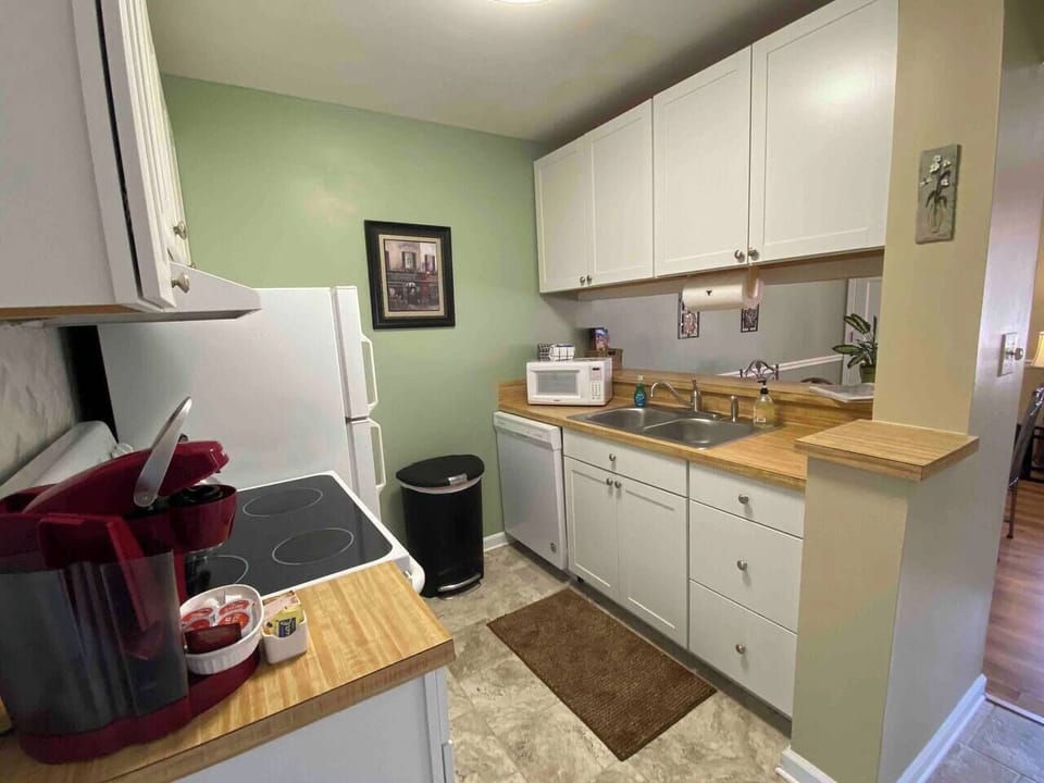 Well stocked kitchen with coffee station