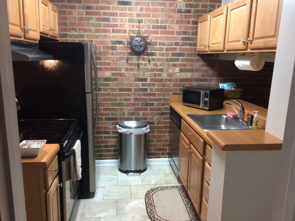 Kitchen complete with oven/stove, refrigerator/freezer, dishwasher and microwave.  