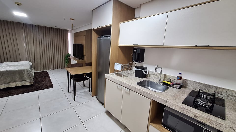 Luxury Double Room, Lake View | Private kitchen | Microwave, cleaning supplies