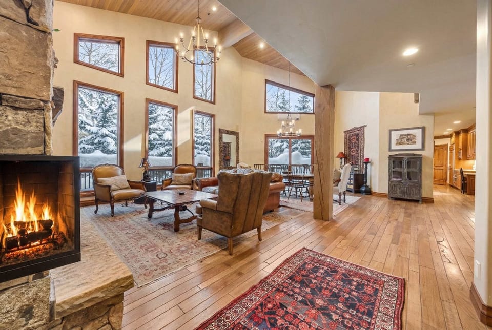 Main floor living room: Smart TV, gas fireplace, radiant heating, mountain views