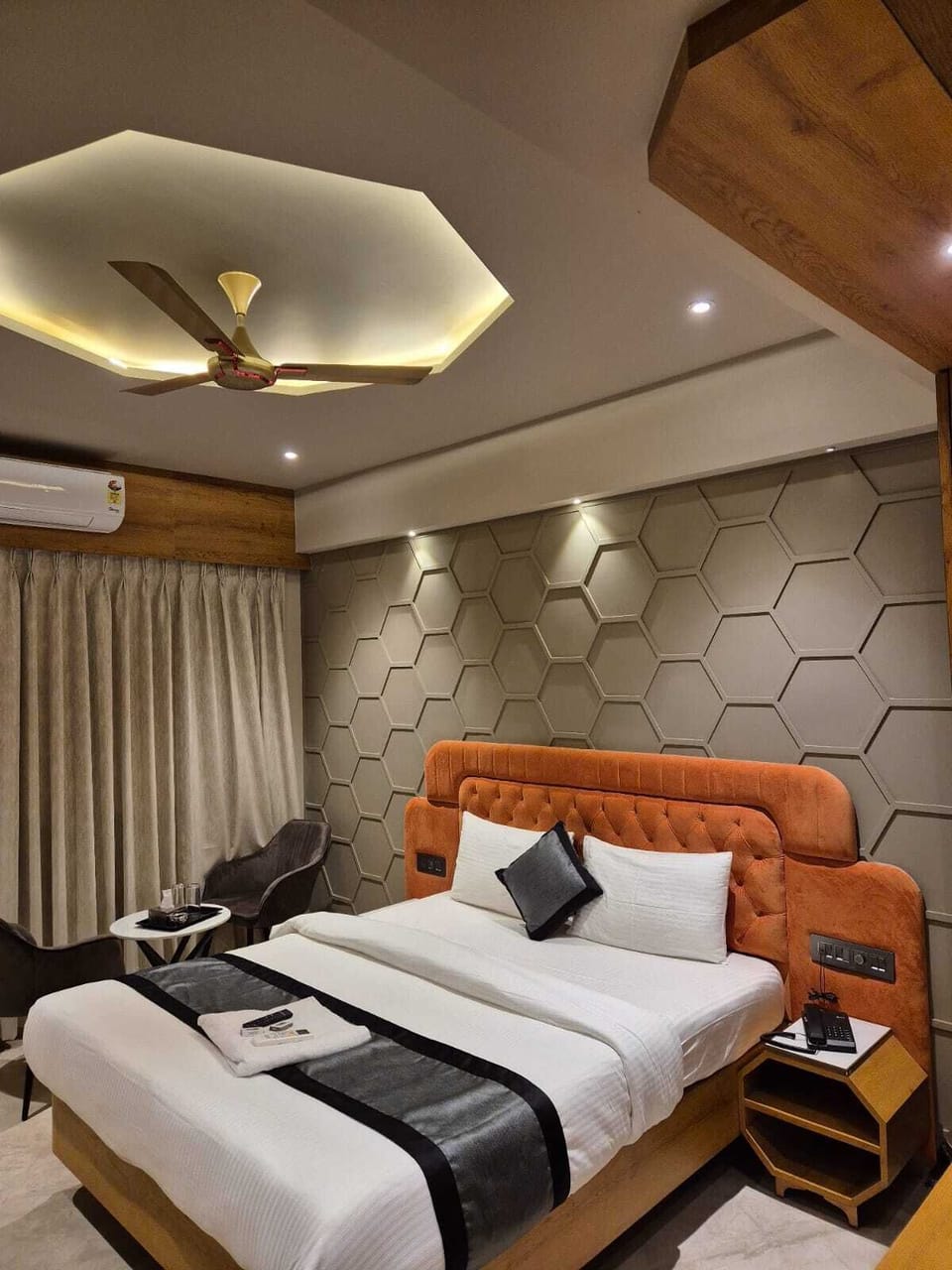 Desk, laptop workspace, bed sheets