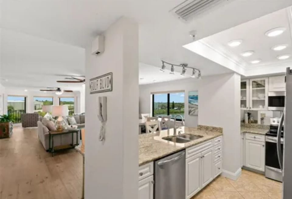 Kitchen has dishes, pots, utensils and all small and large appliances.