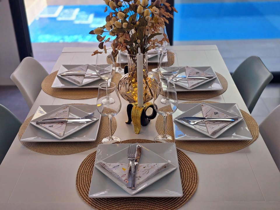 Inside dining with views of the pool.