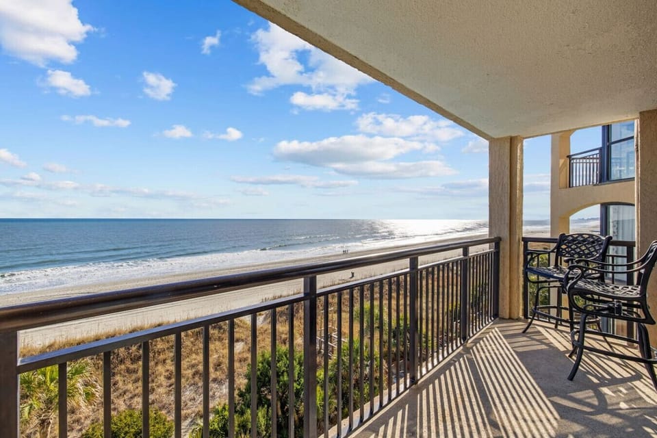 Direct Extended Oceanfront Balcony at Beach Cove Resort Tower C.  27` of balcony gives you plenty of room to relax and enjoy this 4th floor view of the pools, hot tubs, lazy river, and fountains as well as the stunning Atlantic Ocean and shoreline.