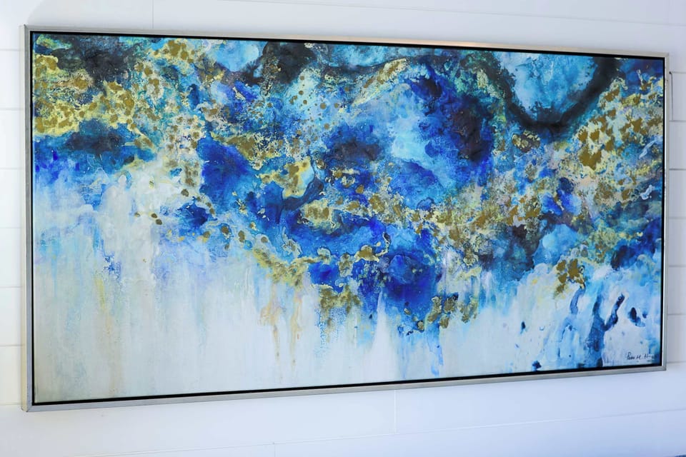 Art meets the ocean in this stunning coastal-inspired piece, adding a splash of color and elegance to your stay. A beautiful reminder of the sea, thoughtfully placed to enhance your relaxing beachfront escape.