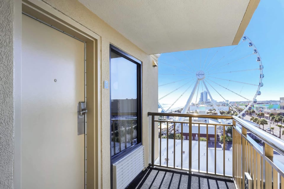 Step outside your door to stunning views of the Myrtle Beach SkyWheel and boardwalk excitement. This unique balcony offers a front-row seat to the fun, perfect for people-watching and soaking in the vibrant coastal energy.
