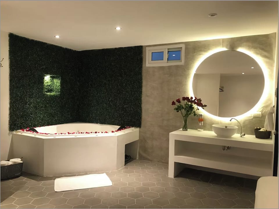Luxury Suite, Private Bathroom | Desk, laptop workspace, blackout drapes, WiFi (free)