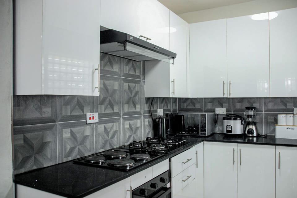 Cottage | Private kitchen | Full-size fridge, microwave, oven, stovetop