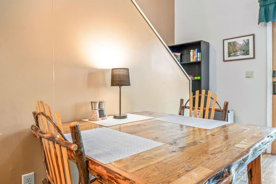 There is a small dining table just off the kitchen with seating for two.