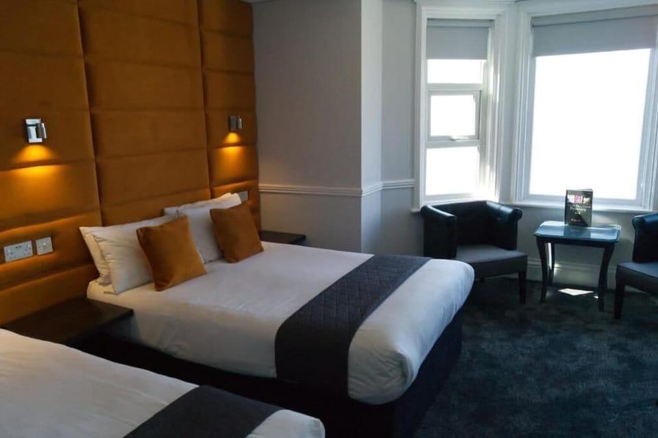 Superior Triple Room, Sea View | Desk, soundproofing, iron/ironing board, free WiFi