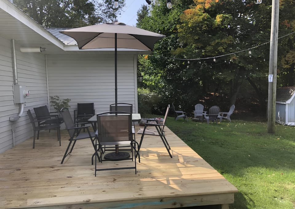 Outdoor deck area with fire pit