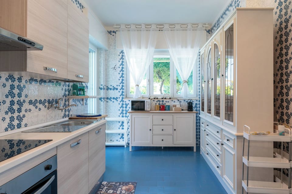 Deluxe Villa, Pool View | Private kitchen | Fridge, oven, stovetop, dishwasher