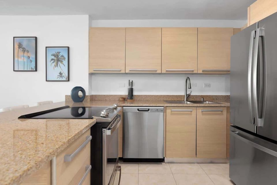 Cook with ease in our well-appointed kitchen. Featuring modern appliances and ample counter space, it's perfect for preparing everything from quick snacks to gourmet meals.