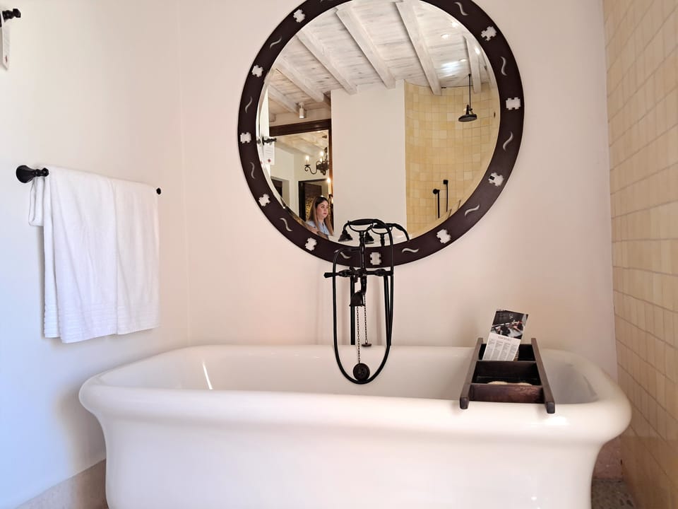 Luxury Villa, 2 Bedrooms, Patio, Ocean View | Bathroom | Combined shower/tub, free toiletries, hair dryer, bathrobes
