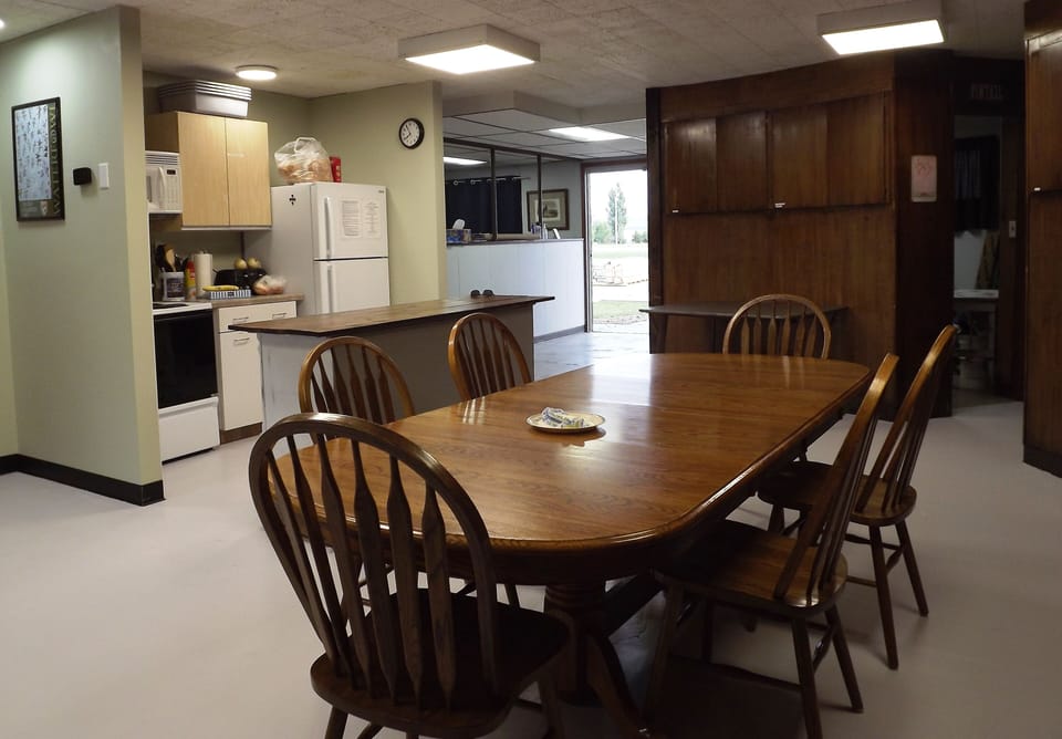 Kitchen and spacious gathering area.