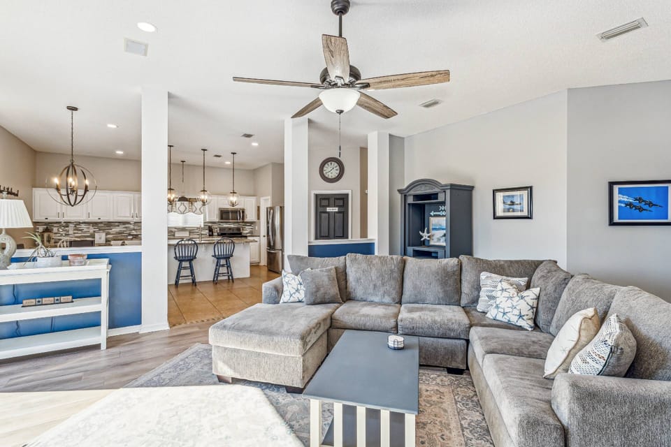 The large living room opens to the dining room and kitchen