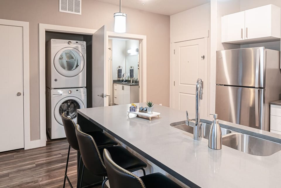 High efficiency washer and dryer (we supply you with laundry pods!)
