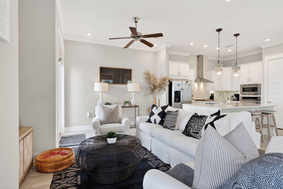 Bright, breezy, and made for relaxing—an open-concept living space with a stylish kitchen just steps away.