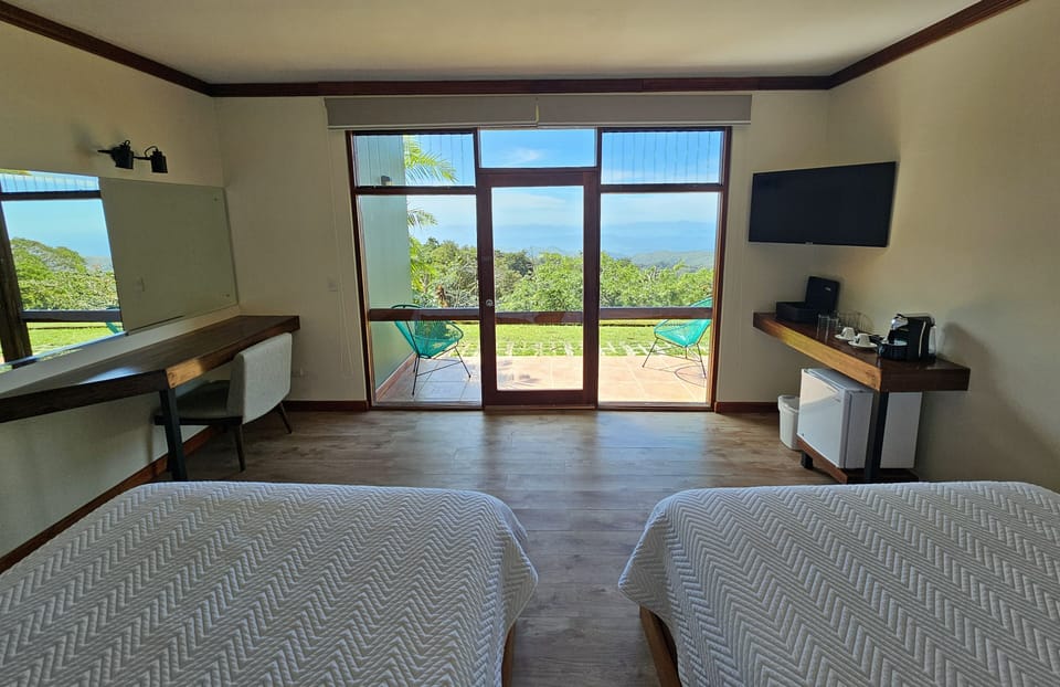 Deluxe Room, 2 Queen Beds | Premium bedding, down comforters, pillowtop beds, in-room safe