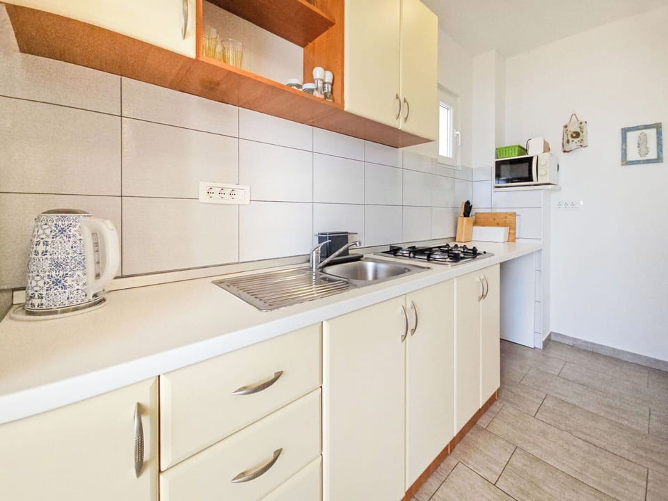Flooring, Kitchen, Interior Design, Countertop, Major Appliance, Kitchen Sink, Floor, Kitchen Appliance, Apartment, Home