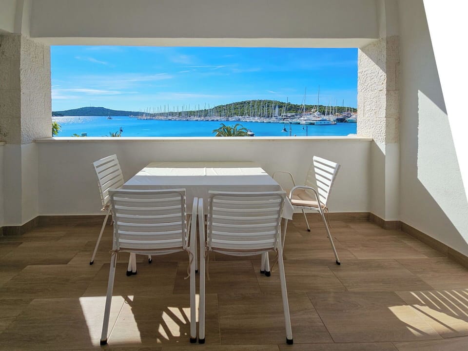 Sea, Shade, Coast, Chair, Outdoor Furniture, Balcony, Resort, Hotel, Kitchen & Dining Room Table, Restaurant