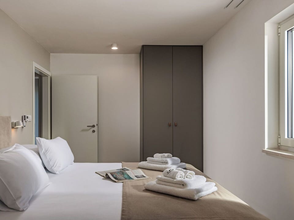Wall, Interior Design, Bedroom, Floor, Bed, Bed Sheet, Flooring, Bedding, Room, Apartment