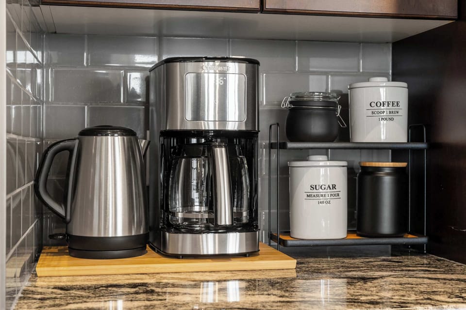 Coffee maker, kettle, and everything set up for your morning.