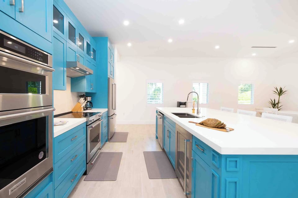 Full kitchen with modern appliances. A drip coffee maker is provided.  