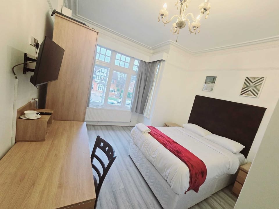 Desk, laptop workspace, free WiFi, bed sheets
