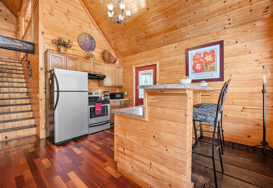 The open kitchen and dining area invite you to share good food and even better company.