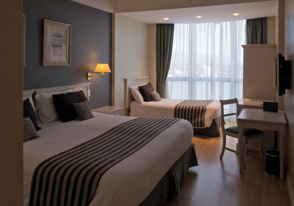 Standard Triple Room | Hypo-allergenic bedding, minibar, in-room safe, desk