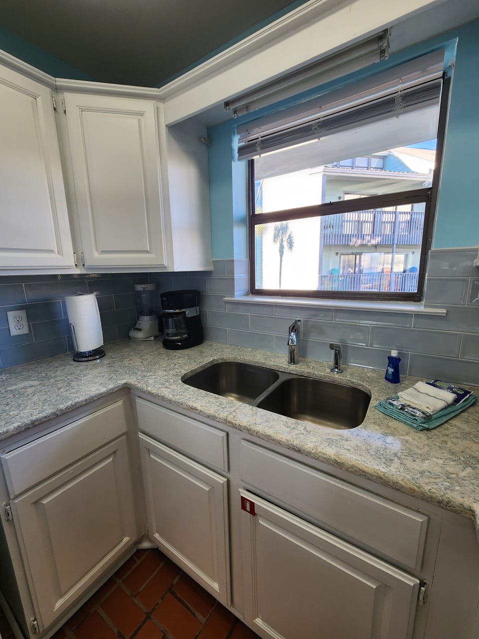 Kitchen area with traditional style coffee maker