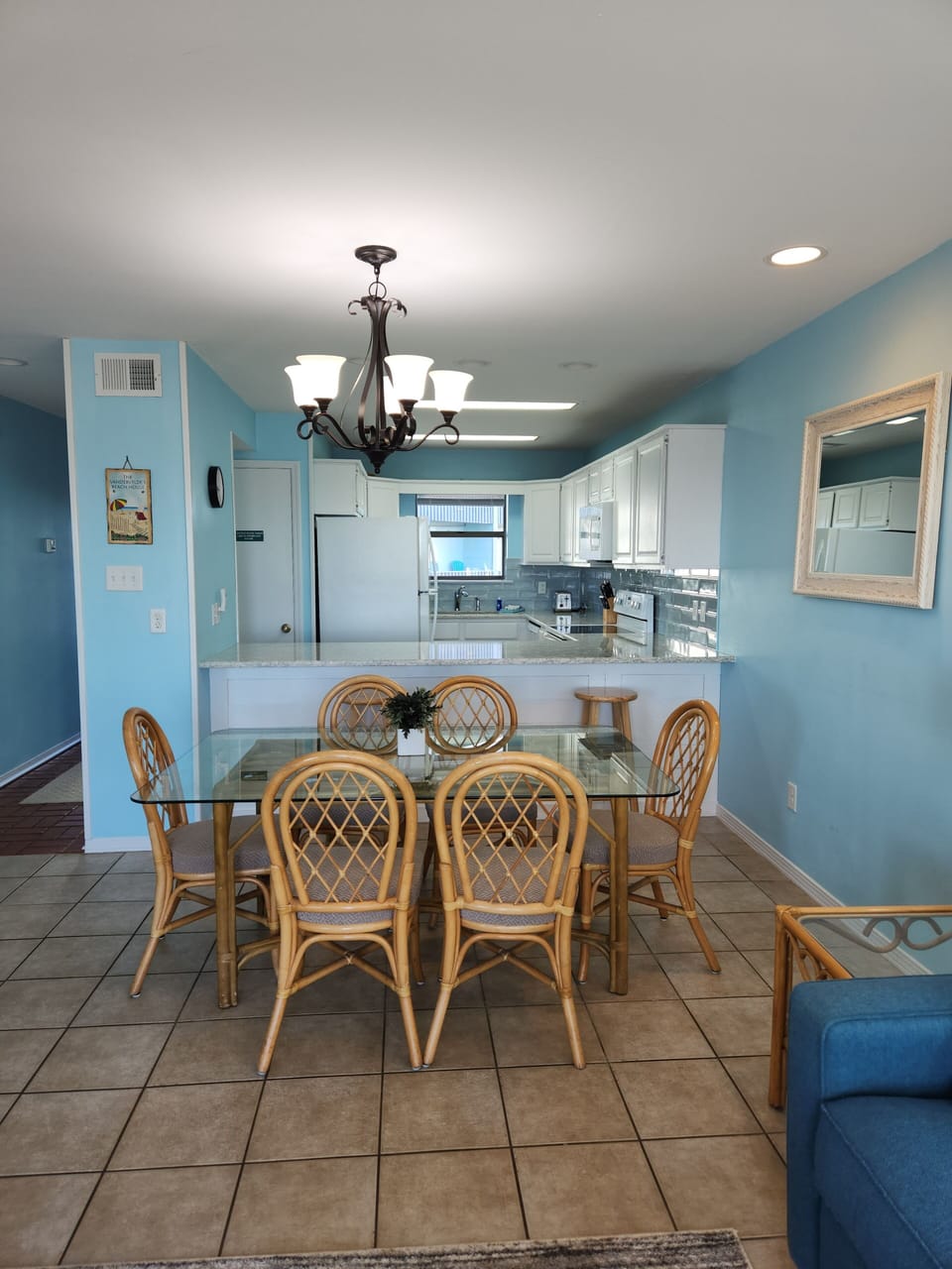 Dining area with 6 chairs and 4 barstools