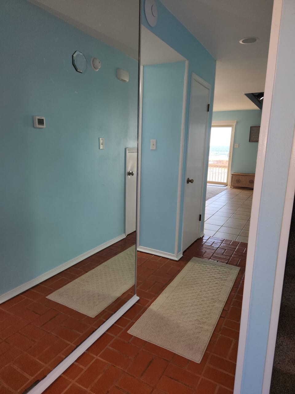 Hallway between front door and living room