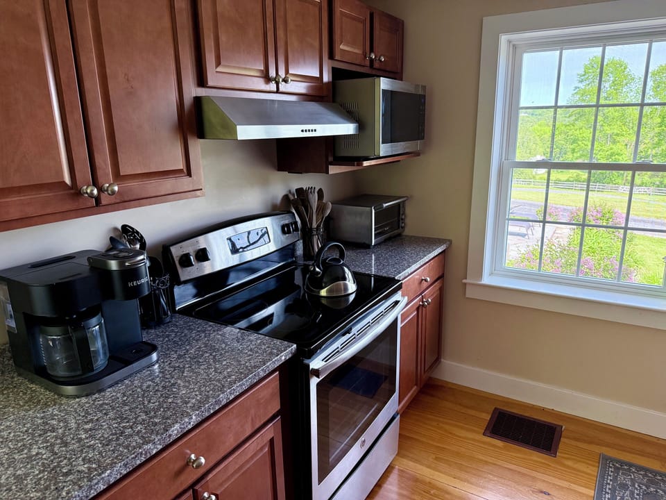Kitchen has granite countertops