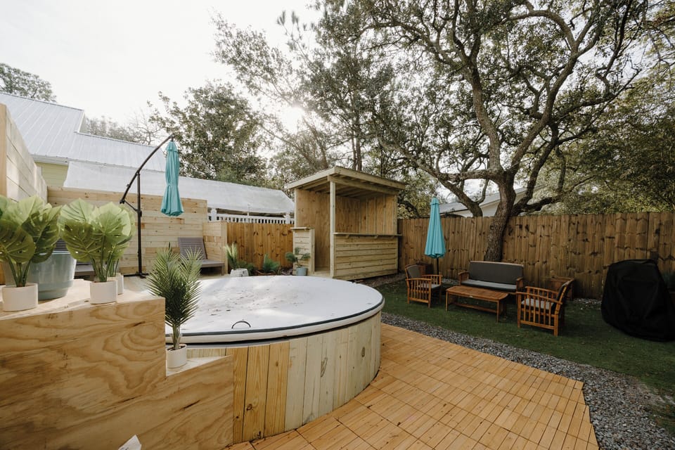 Fully fenced turf backyard with dog bowls, bags, and plenty of room to play. A safe, clean outdoor space for pets and kids to enjoy